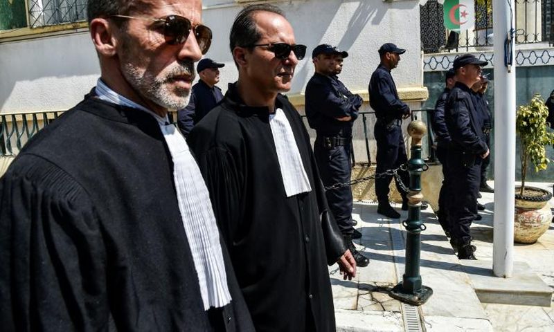 Algerian lawyers and judges gather to support the independence of the judiciary outside the Justice Ministry in Algiers on April 13, 2019. Magistrates who play a key role overseeing the country's elections, say they will boycott a July 4 presidential e...