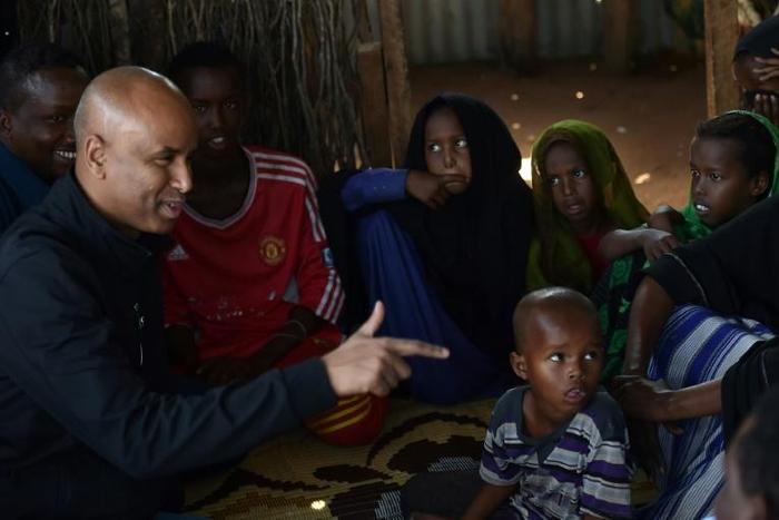 Canadian Immigration Minister Ahmed Hussen (L, pictured September 2017) said Canada is taking steps to resettle 750 ex-slaves from Libya, as well as 100 refugees from Niger