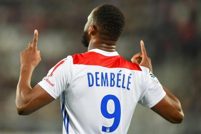 Vintage goal: Moussa Dembele celebrated after giving Lyon victory in Bordeaux
