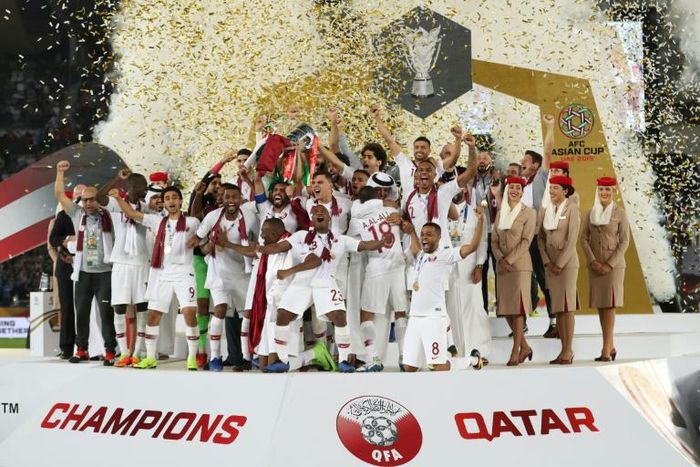 Qatar's players celebrate their win at the 2019 AFC Asian Cup on February 1, 2019, stunning four-time champions Japan as the Gulf nation claimed its first Asian Cup title