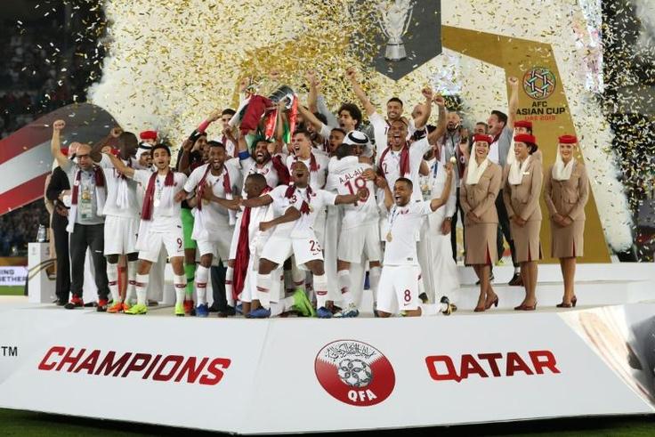 Qatar's players celebrate their win at the 2019 AFC Asian Cup on February 1, 2019, stunning four-time champions Japan as the Gulf nation claimed its first Asian Cup title