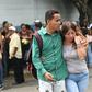 Families of prisoners who died in a riot in a police station jail wait in front of a morgue in Acarigua, Venezuela on May 25, 2019