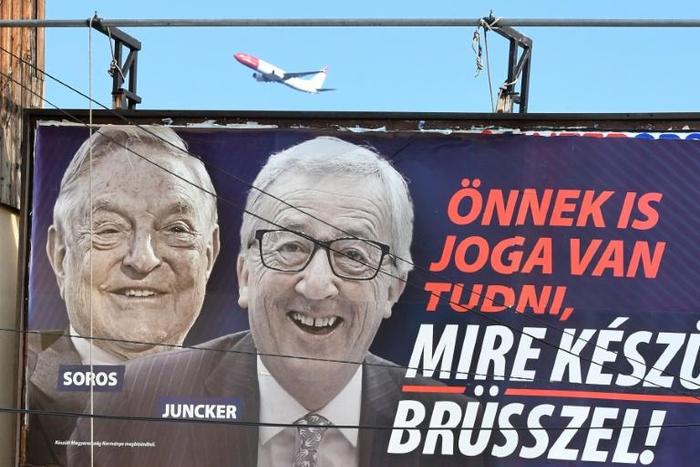 Hungary will end a controversial poster campaign, which the European Commission called "at worst downright factually incorrect, or at best highly misleading"