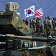 South Korean and US soldiers observe a live fire drill at the Seungjin Fire Training Field in Pocheon, 65 kms northeast of Seoul, in April 2017, before the joint exercises were postponed
