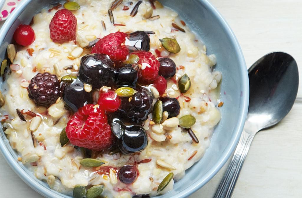 A warm bowl of oats, berries and nuts
