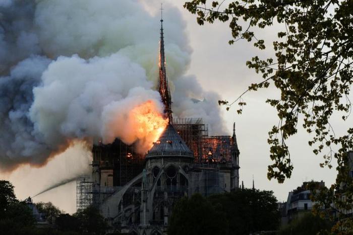 Some of the hundreds of tonnes of lead in the spire and the roof of Paris' Notre Dame cathedral melted in the extreme heat from the blaze