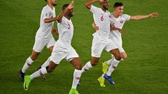 Qatar players celebrate scoring in their Asian Cup final win over Japan