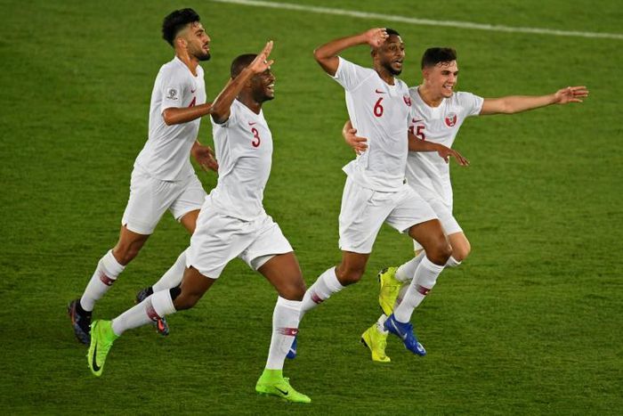 Qatar players celebrate scoring in their Asian Cup final win over Japan
