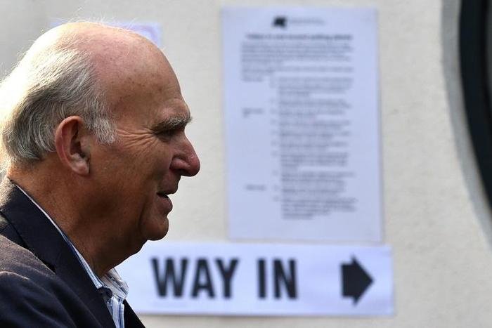 Liberal Democrats leader Vince Cable arrives to vote in the European Parliament elections on Sunday which preliminary results later showed his party winning the anti-Brexit vote