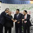 Algeria's ruling coalition principals -- (L to R) Amara Benyounes, Ahmed Ouyahia, Mouad Bouchareb, and Amar Ghoul -- shake hands after agreeing to back President Abdelaziz Bouteflika for a fifth term in Algiers on February 2, 2019