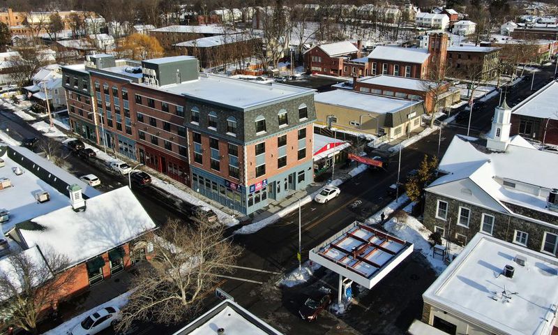 New York City Transplants and a River Town's Natives Fight for Its Soul