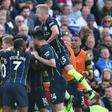 Premier League champions Manchester City celebrate their third goal against Brighton