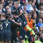 Premier League champions Manchester City celebrate their third goal against Brighton