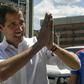 Venezuelan opposition leader and self declared acting president Juan Guaido gestures to supporters at the end of a rally with volunteers