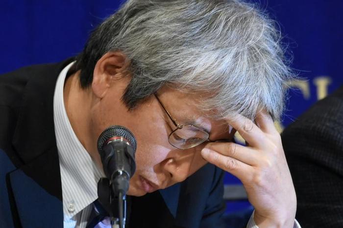 Motonari Otsuru, the chief lawyer for detained tycoon Carlos Ghosn, cut a cautious figure at his only press conference