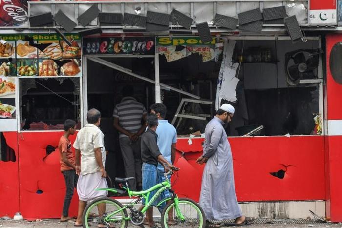 Rampaging mobs set fire to Muslim-owned shops, vandalised homes and attacked several mosques