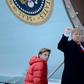 US President Donald Trump says he would not encouragae his son Barron, seen here boarding Air Force One with his father, to play American football