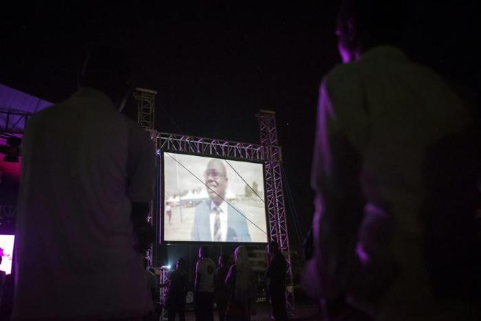 Viewers in Accra gather in June 2018 to watch a documentary that accused former Ghanian Football Association (GFA) president Kwesi Nyantakyi of soliciting millions of dollars in bribes