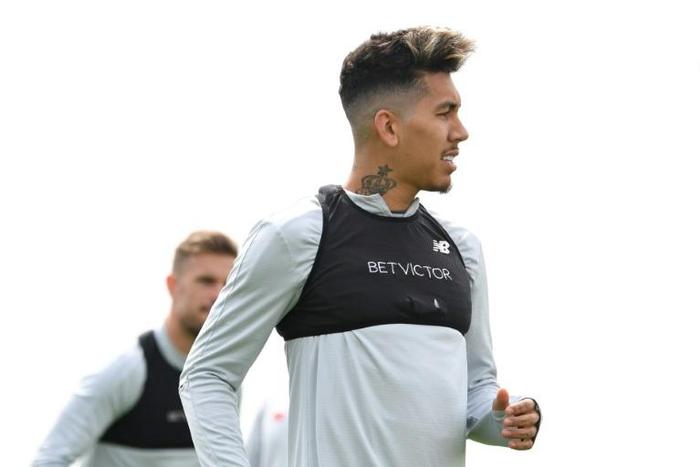 Fitness boost - Roberto Firmino taking part in a team training session at Liverpool's Melwood training ground on Tuesday