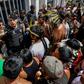 Brazilian indigenous people (Guarani pictured March 2019 protesting their healthcare conditions in Sao Paulo) warned that since Bolsonaro's election, "we are experiencing the first stages of an apocalypse"