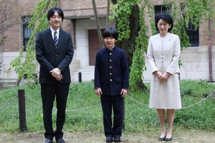 Police are questioning a man after two knives were found at the school desk of Prince Hisahito (C, with his parents Prince Akishino and Princess Kiko)