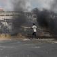 Smoke rises from a barricade in Wednesday's unrest