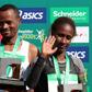 Ethiopia's Abrha Milaw and Gelete Burka celebrate their victories in the Paris marathon