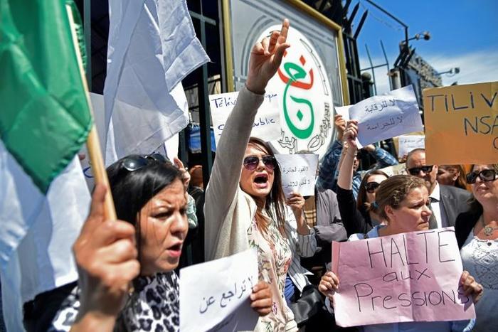 Demonstrators gather during a protest by state TV employees against censorship in the capital Algiers