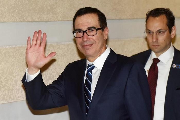 Treasury Secretary Steven Mnuchin (L) says the US team are 'looking forward to several important days of talks' in Beijing