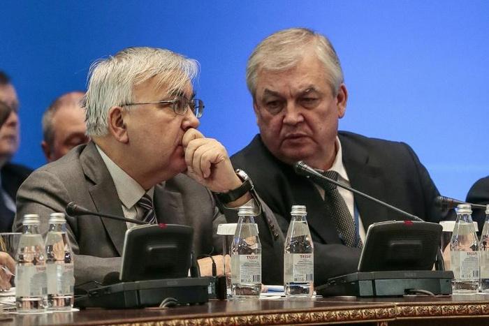 Russia's Syria negotiator Aleksandr Lavrentyev (R, pictured December 2017) said the talks over the constitutional committee were "complex" but "moving forward"