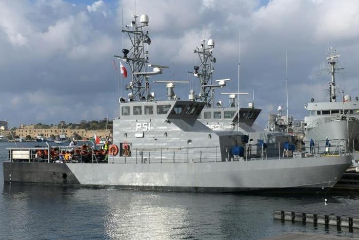 Migrants who were rescued in the Mediterranean prepare to disembark from Malta's P51 Protector-class coastal patrol boat in Valletta, Malta, on April 13, 2019c