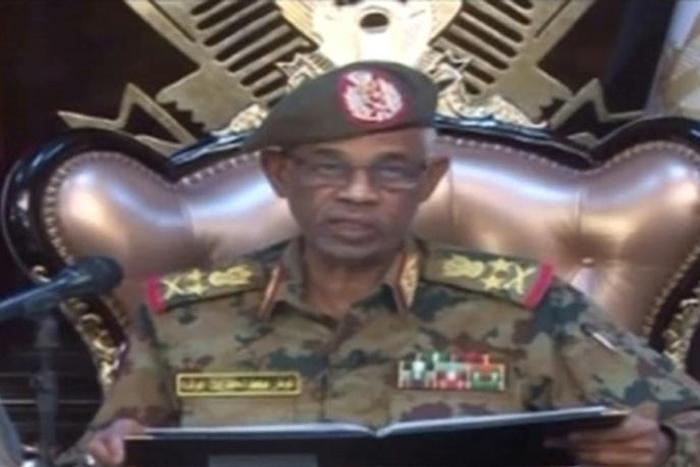 Sudanese Defence Minister Ahmed Awad Ibnouf announces the army's ouster of veteran president Omar al-Bashir in an eagerly awaited state television broadcast that follows four months of nationwide protests