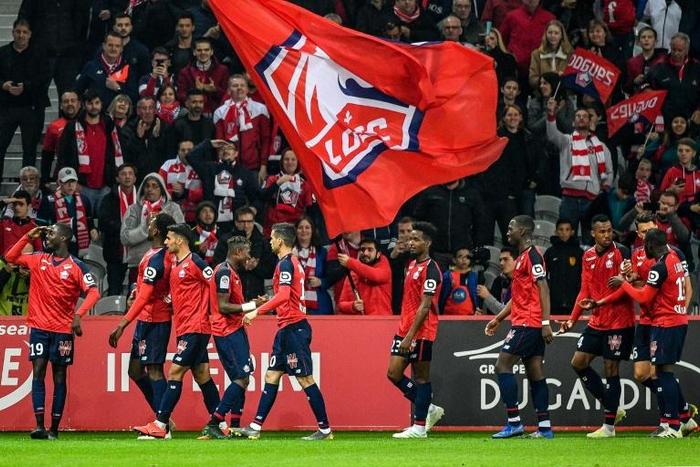 Pepe (L) scored his 20th league goal of the season as Lille thrashed Nimes