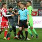 FC Union Berlin players grabbed with Ingolstadt's Almog Cohen after the incident that led a red card for the Israeli midfielder who was then subject to anti-Semitic abuse on Twitter