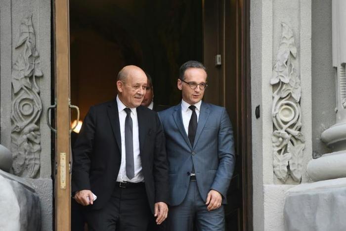 German Foreign Minister Heiko Maas (R) said the Minsk peace process is at "an impasse and that is unacceptable," after a meeting with French colleague Jean-Yves Le Drian (L)