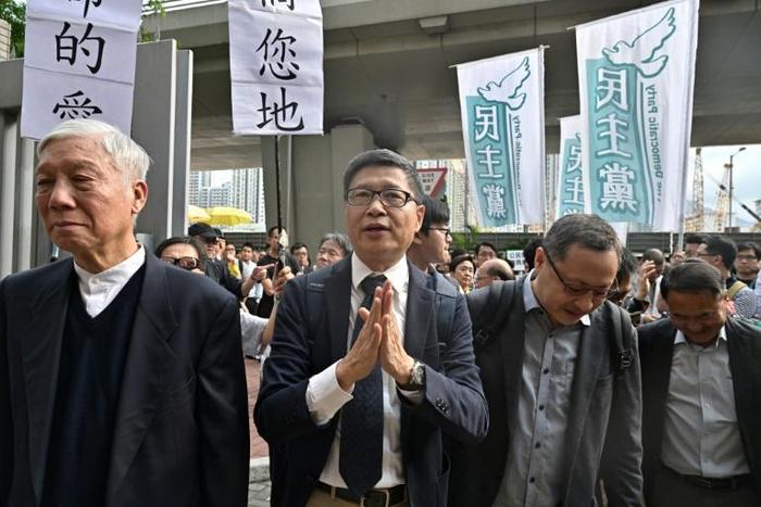 Baptist minister Chu Yiu-ming, law professor Benny Tai and sociology professor Chan Kin-man arrive at court on Tuesday