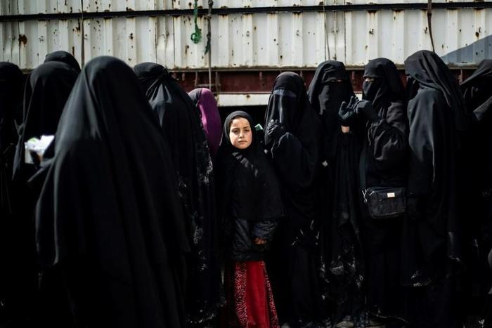 Thousands of Iraqi refugees are crammed into camps in northeastern Syria alongside Syrian women and children who fled the last stand of the Islamic State group's "caliphate" before its defeat by Kurdish-led forces in March