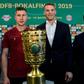 Leipzig coach Ralf Rangnick and his captain Willi Orban posed with the German cup alongside Bayern captain Manuel Neu and coach Niko Kovac