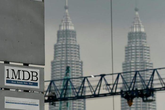A former Goldman Sachs banker is scheduled to appear in US court today to face criminal charges in the 1MDB scandal