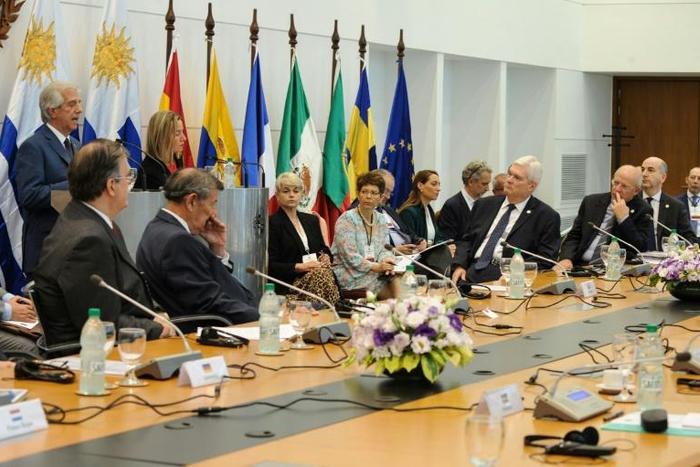 Uruguay's President Tabare Vazquez (top-L) and High Representative of the European Union for Foreign Affairs and Security Policy Federica Mogherini (top-2-L) speaking during a meeting with Ministers from more than a dozen European and Latin American st...