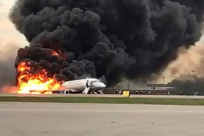 Flames and thick smoke were pouring from the aircraft as it landed