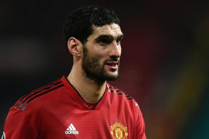 Marouane Fellaini arrived in Hong Kong on Sunday to meet with teammates but flew home to Belgium that night for treatment