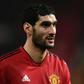 Marouane Fellaini arrived in Hong Kong on Sunday to meet with teammates but flew home to Belgium that night for treatment