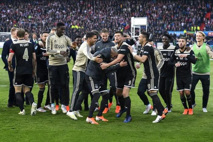 Ajax players celebrate after winning the Dutch Cup final against Willem II on Sunday