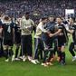 Ajax players celebrate after winning the Dutch Cup final against Willem II on Sunday