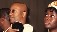 Late John Singleton, Akosua Busia and their child