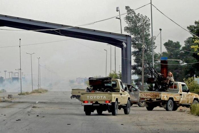 Militia fighters in clashes with forces loyal to strongman Khalifa Haftar in al-Hira region around 70 kilometres south of Tripoli on Tuesday