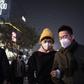 A couple wears a protective mask to fight smog in Beijing last year. A new study says exposure to air pollution directly increases the risk of diabetes
