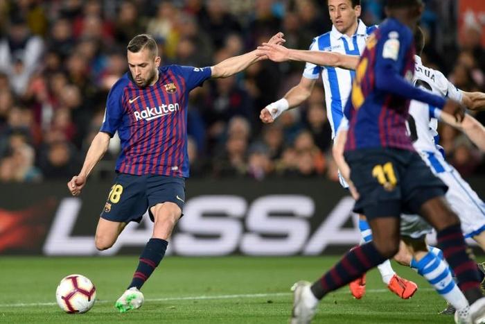 Jordi Alba's goal gave Barcelona a 2-1 win over Real Sociedad on Saturday
