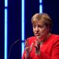 GMerkel responded to Federation of German Industry criticism over "faint-hearted" policies by firing a salvo at the car industry over the emissions scandal